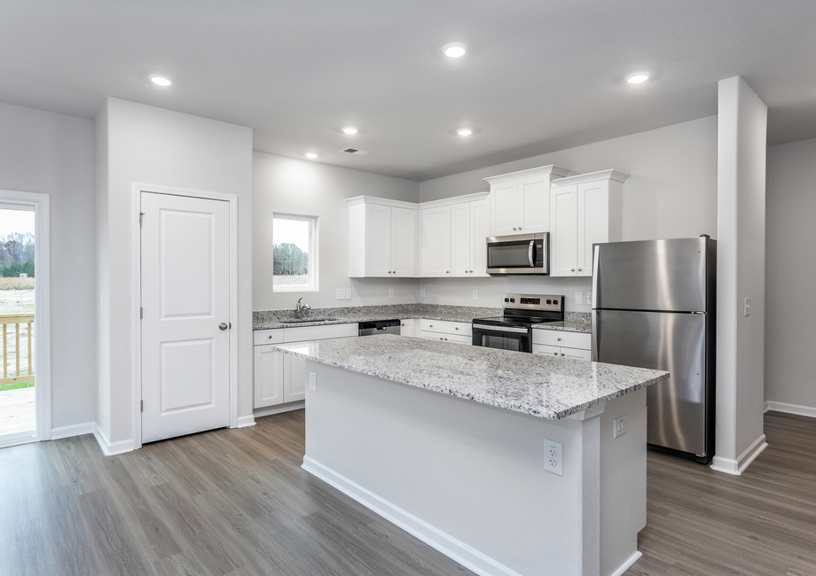 The kitchen comes with stainless-steel appliances