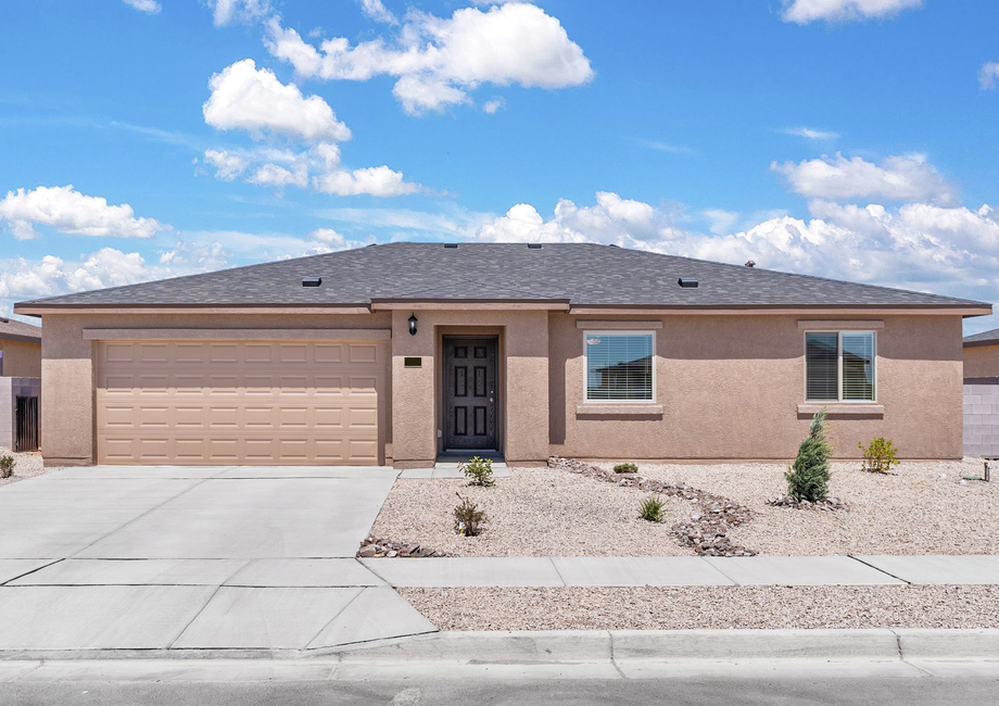 This home has a spacious 2-car garage and stucco exterior. 