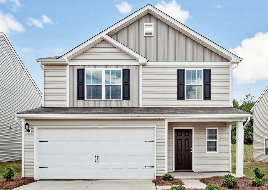 Two-story Camden with vinyl siding and front yard landscaping.