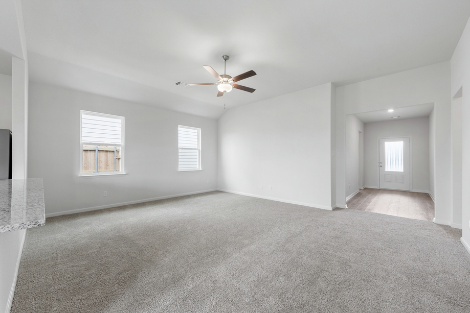 Upon entering the home, the foyer leads you to the family room.