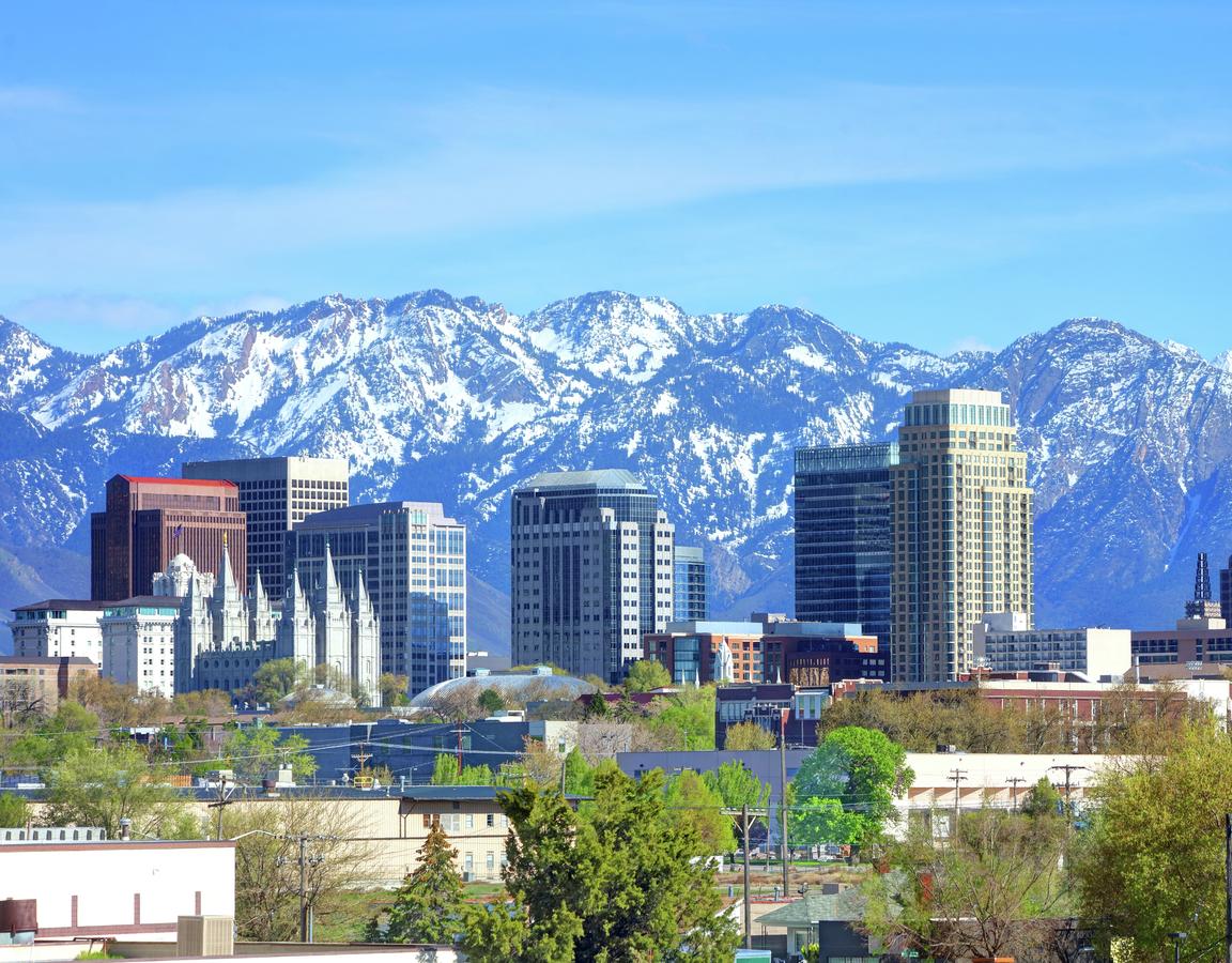 Salt Lake City skyline with mountains in the background.