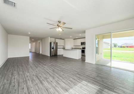 The entertainment space is open-concept with the family room, dining room and kitchen included