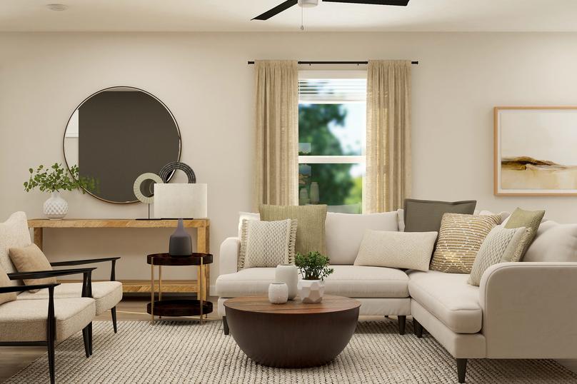Rendering of the living room, which is
  furnished with a sectional couch, two armchairs, a coffee table and side
  table. Behind the couch is a window and console table.