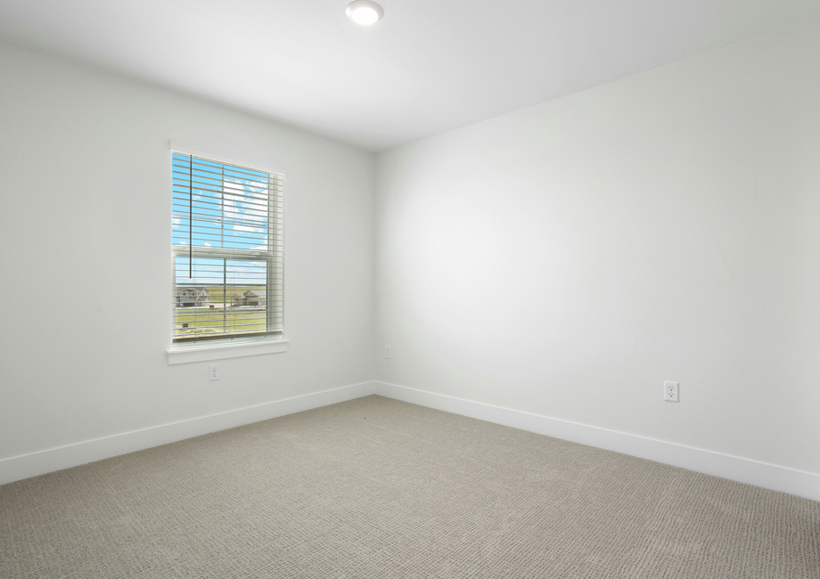 The secondary bedrooms are a great space for a children's bedroom or a guest room.