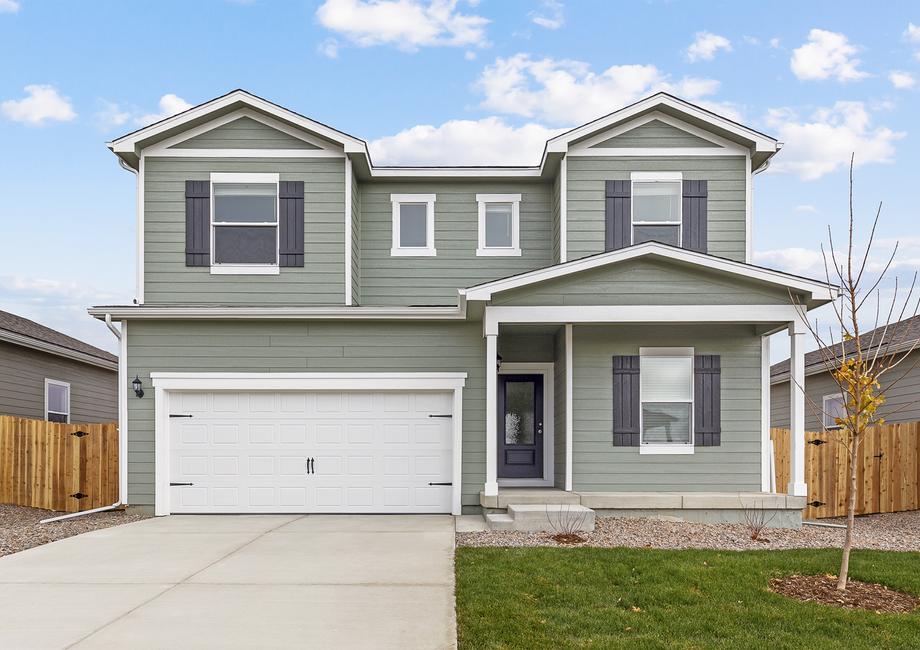 Exterior of the two-story Columbia with professional front yard landscaping.