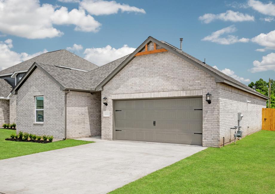 The Durant has a large front yard and driveway that leads to the two-car garage.