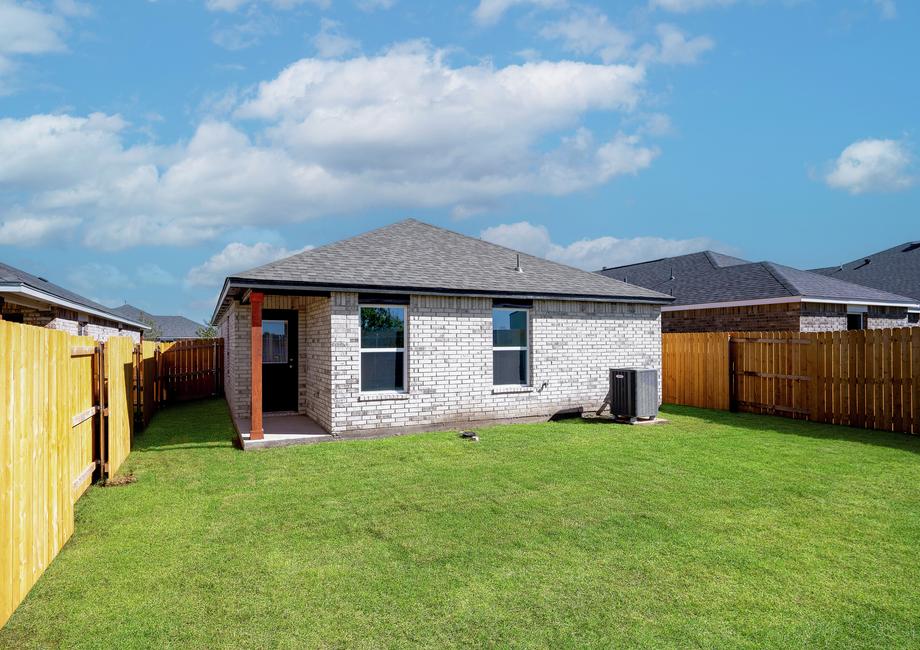 The back yard of the Coastal is fully fenced-in.