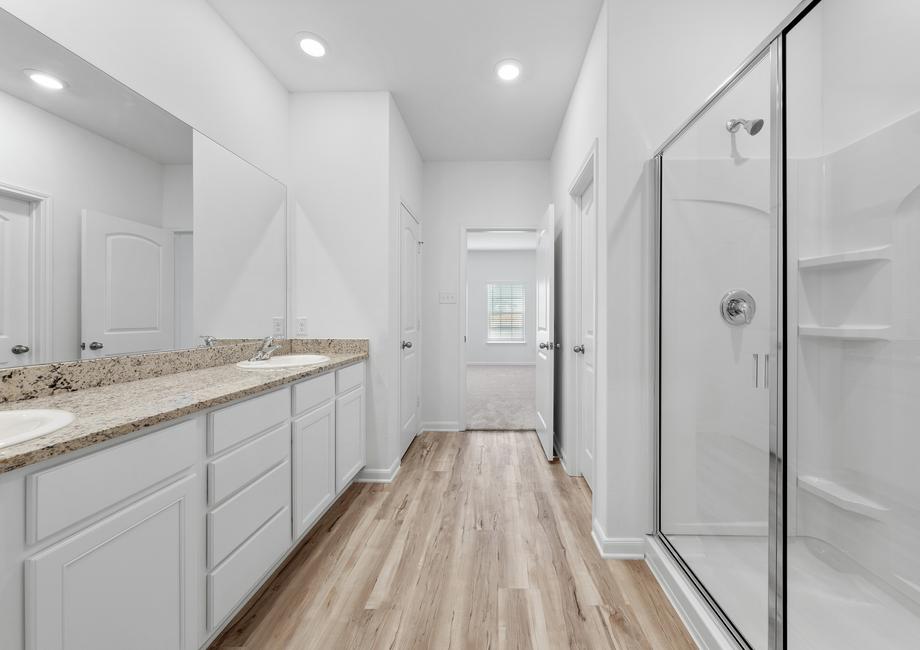 A step-in shower in the master bathroom