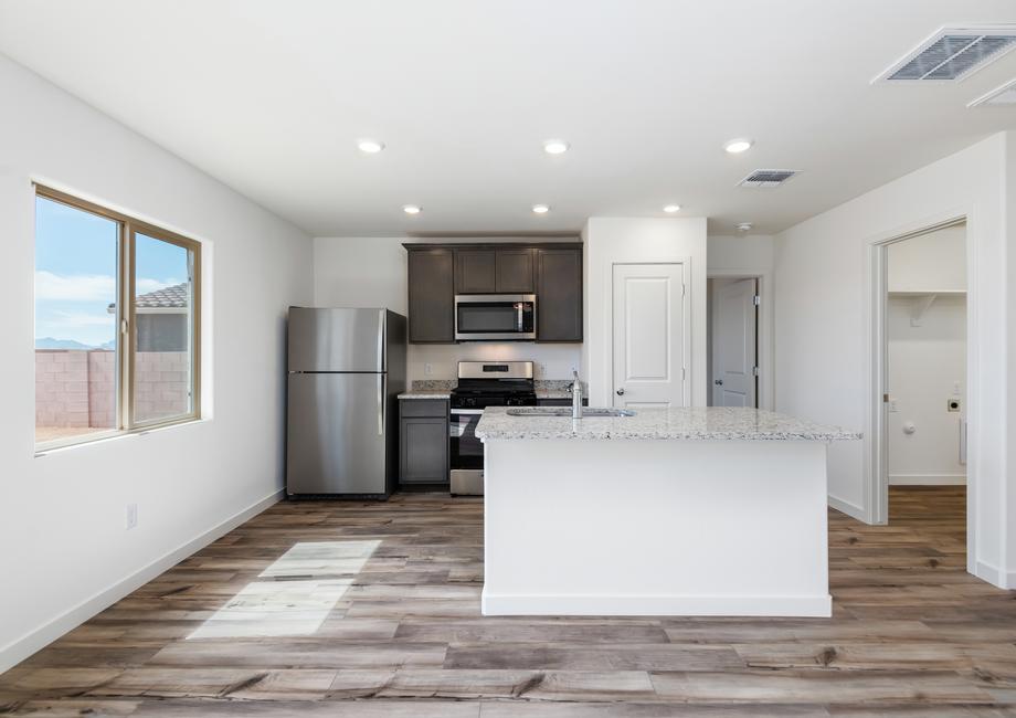 The kitchen of the Amado has stainless-steel appliances and granite countertops.