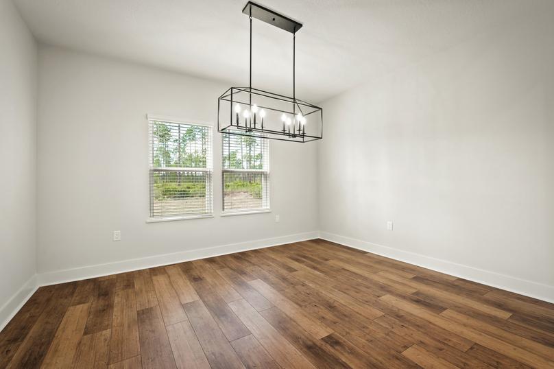 The breakfast area is spacious and offer views of the large back yard.