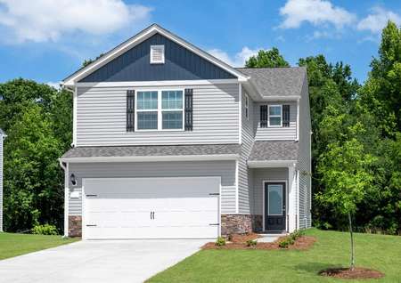 This home has a spacious two-car garage and covered front porch.