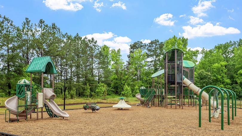 Swing set and two play structures.