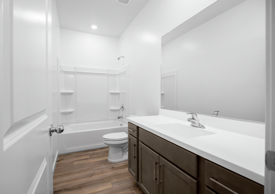 The guest bathrooms are the perfect space for guests to get ready.