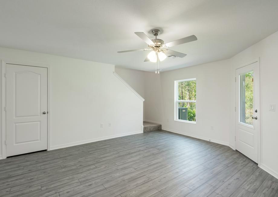 The family room is spacious with plenty of natural light