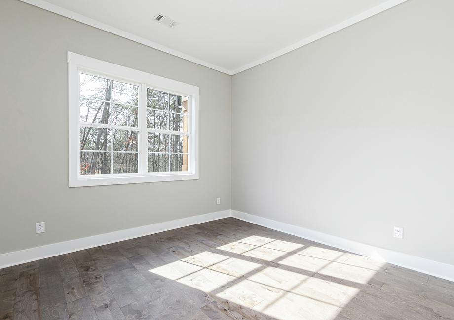 Large windows fill the secondary bedrooms with plenty of light.