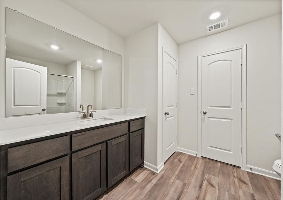 The private master bathroom of the Rio Grande has plenty of vanity space.