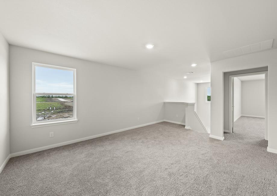 The loft of the Rayburn is a great space for a gameroom or playroom.