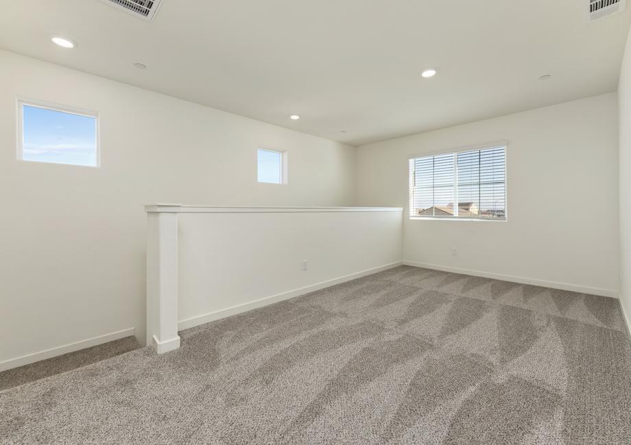 The game room is upstairs and has carpet. 