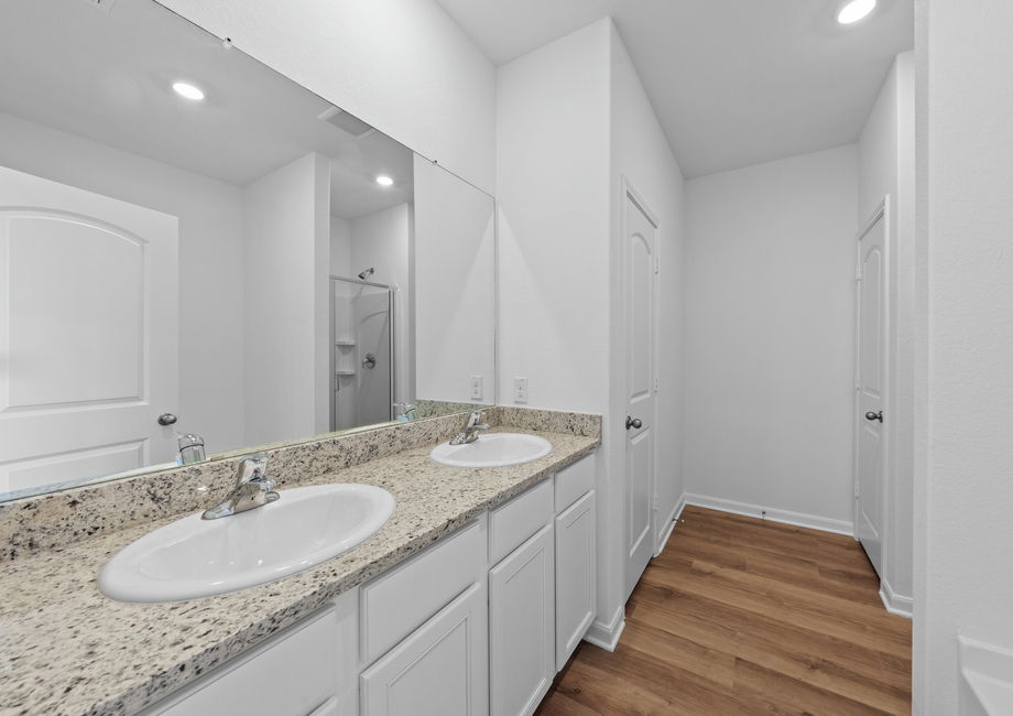 Dual sink vanity in the master bathroom