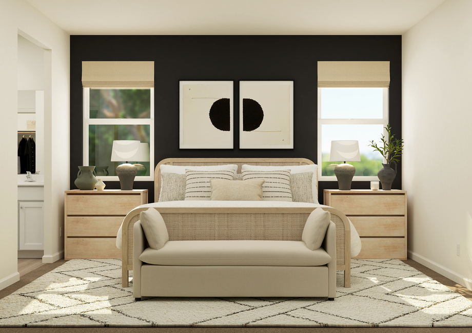 Rendering of a
  master bedroom furnished with a large white bed in between two bedside
  tables. There is also a bench at the end of the bed.