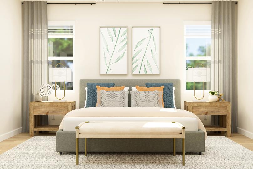 Rendering of the owner's suite featuring
  oversized furniture atop wood-look flooring with lots of natural light.