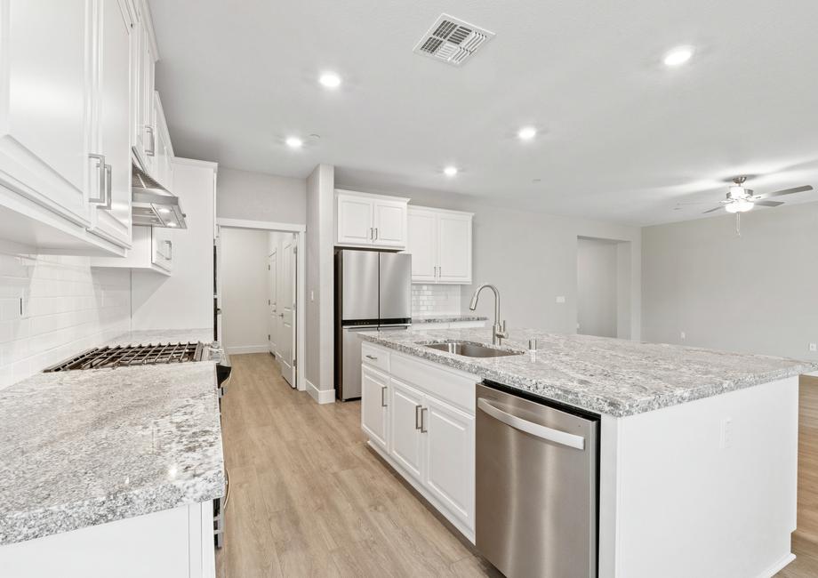 The kitchen comes with a full suite of stainless steel appliances!