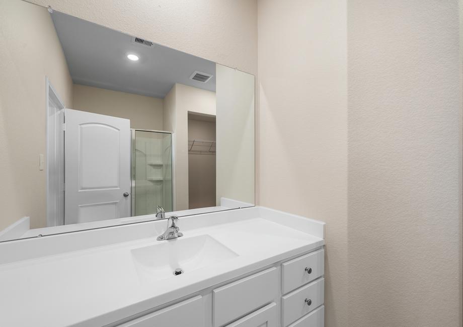 The master bathroom has plenty of counter space