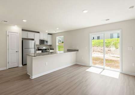 The kitchen opens up to the dining room