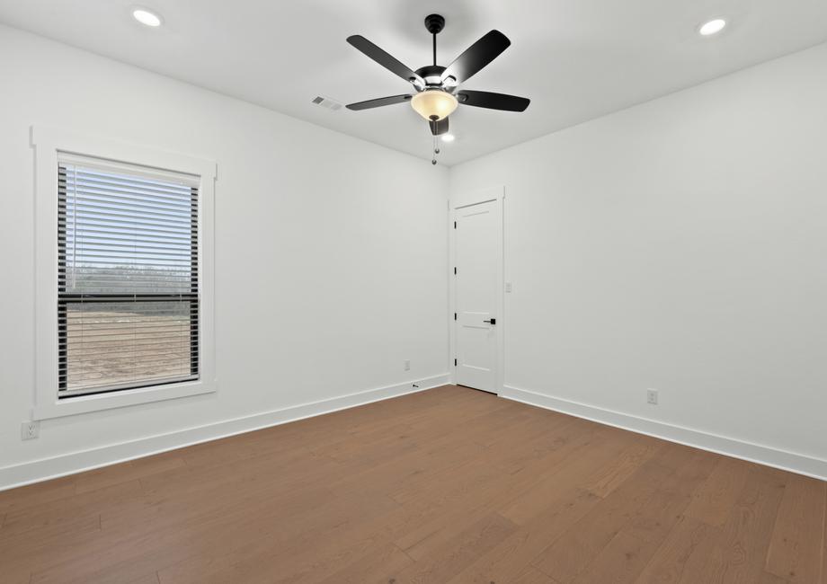 The secondary bedrooms in this home are the perfect space for children's bedrooms or guest rooms.