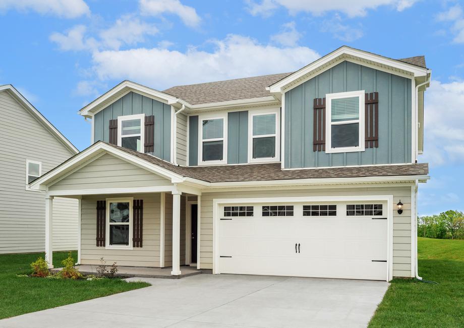 The Franklin is a beautiful two story home with siding and front yard landscaping