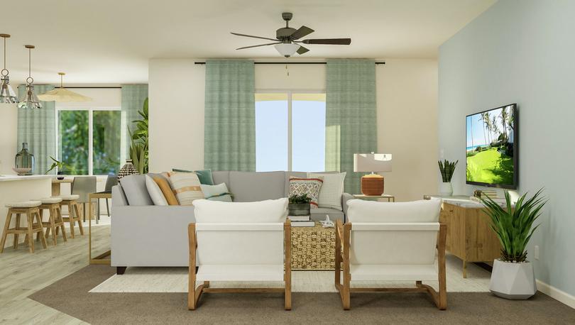 Rendering of the spacious living room
  with sectional couch, two accent chairs and an entertainment center.