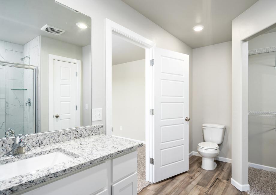 The master bathroom of the Coastal has a large vanity space.