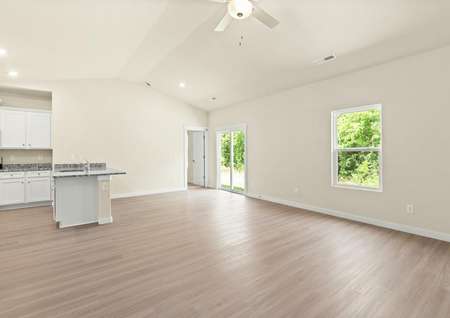 The living room opens up to the kitchen.