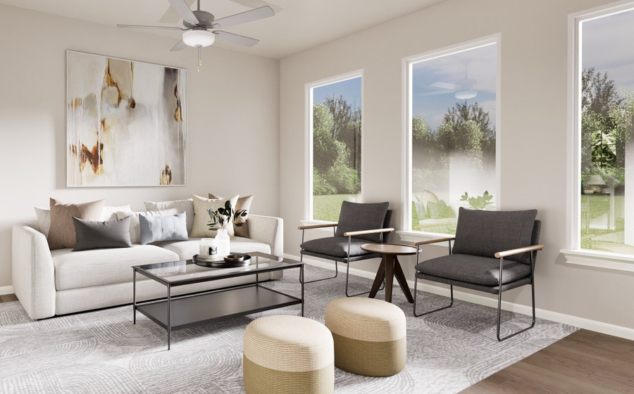 Modern living room with a beige sofa, gray chairs, and abstract art on the wall. Large windows bring in natural light. Soft, neutral tones create a serene atmosphere.