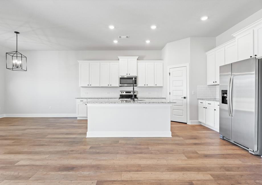 Beautifully designed Kitchen boasting an enormous island to prepare delight bites.