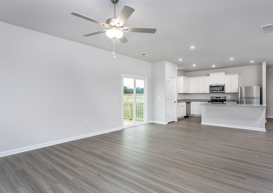 The living room is open to the kitchen