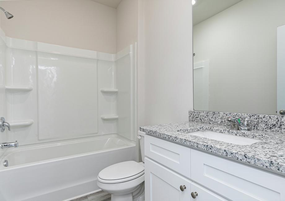 The secondary bathroom allows plenty of space for your family to get ready in the mornings