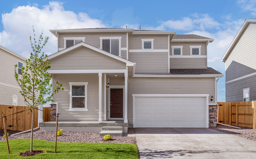 The Yosemite is a beautiful two story home with siding.