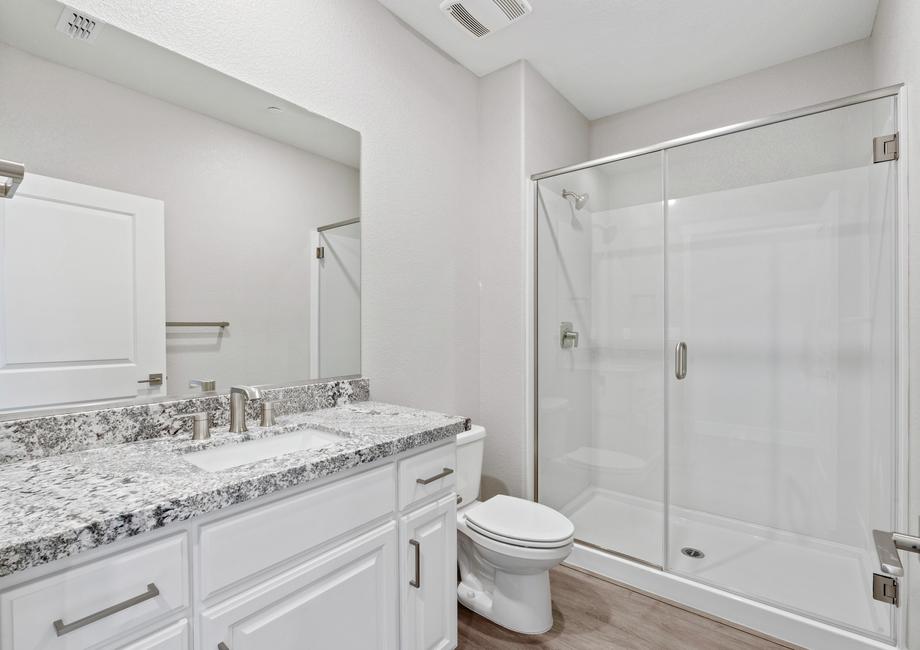 Here is the secondary bathroom with a beautiful vanity.