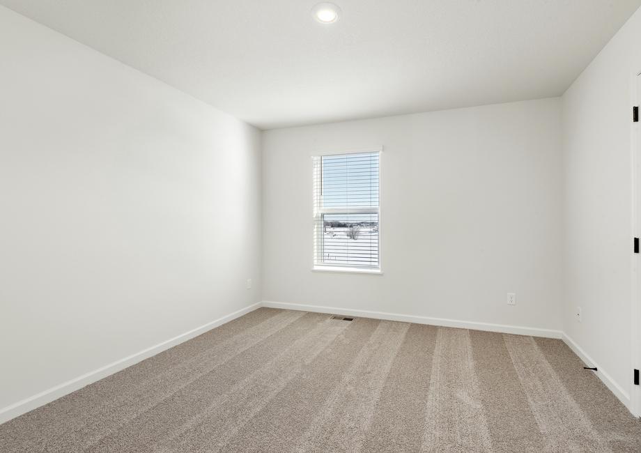 The master bedroom is spacious