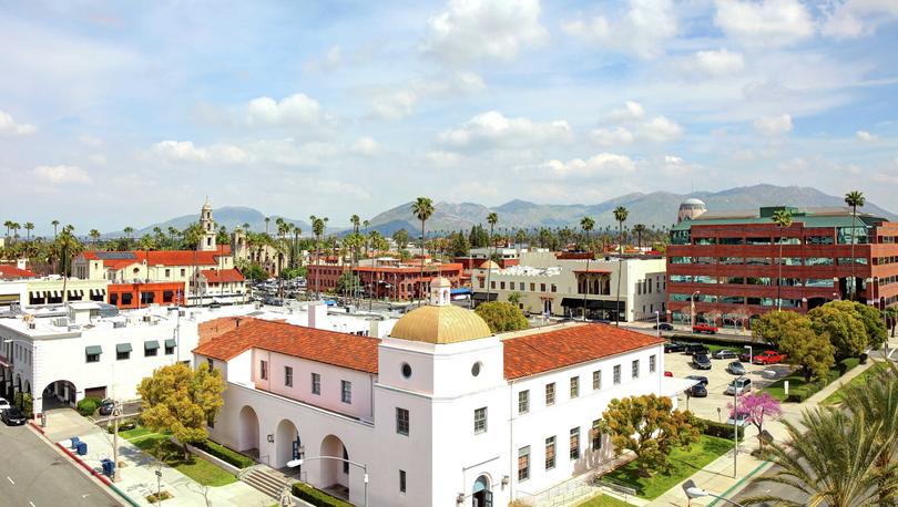 Riverside, California picture of historic buildings alongside modern offices and countless palmtrees