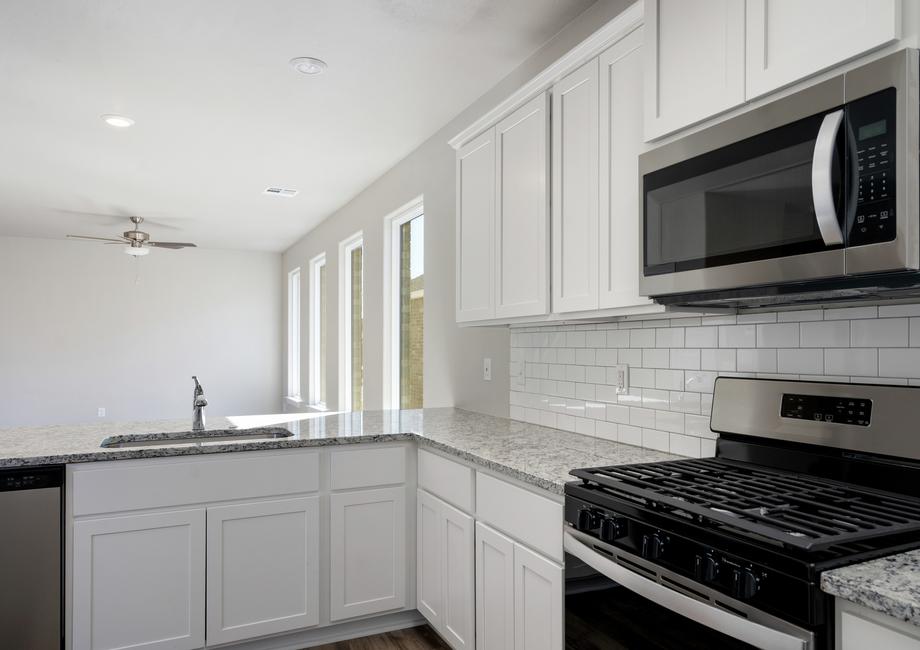 The kitchen of the Sudan has sprawling granite countertops.