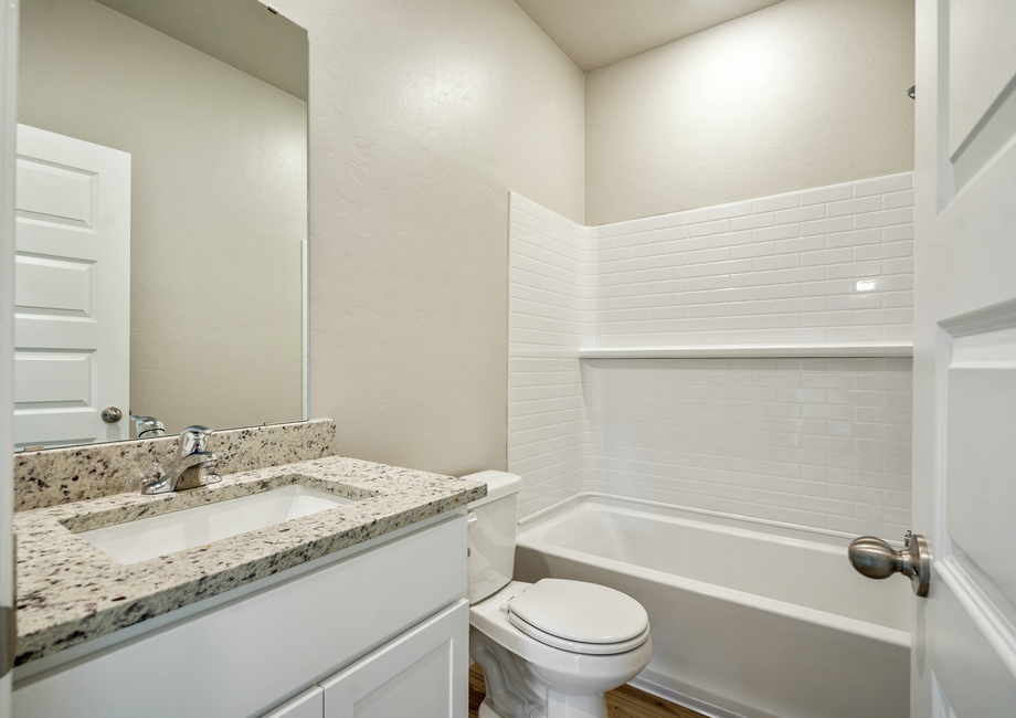 This floor plan has plenty of room for guests and family to get ready!