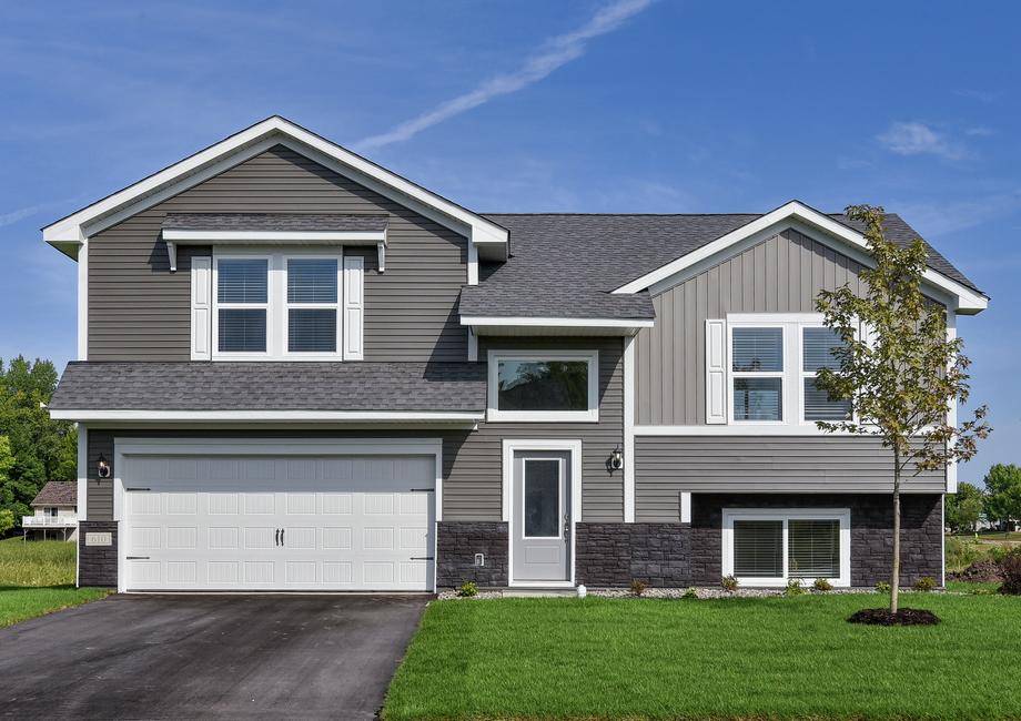 The Lincoln is a beautiful two story home with siding and stone.