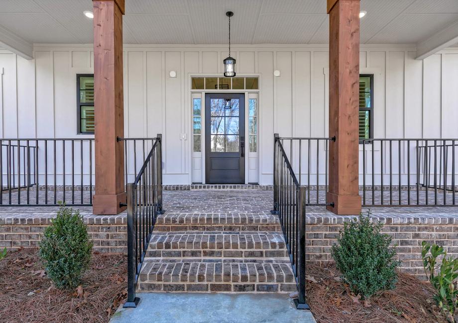 Front porch with brick flooring.