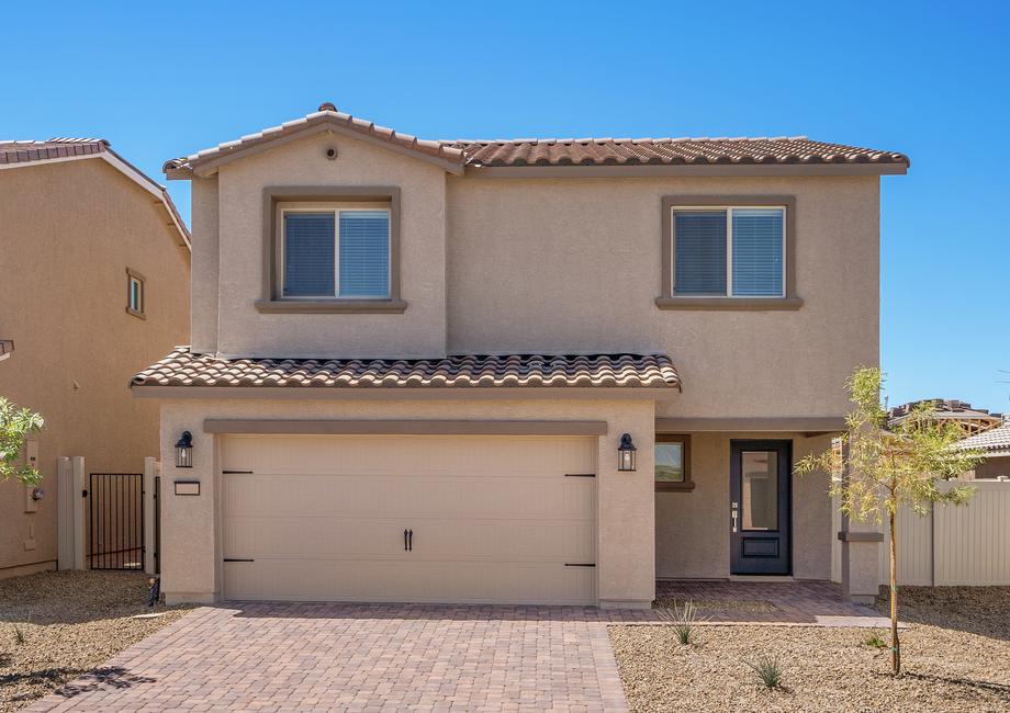 The Hawthorne is a beautiful two story home with stucco.
