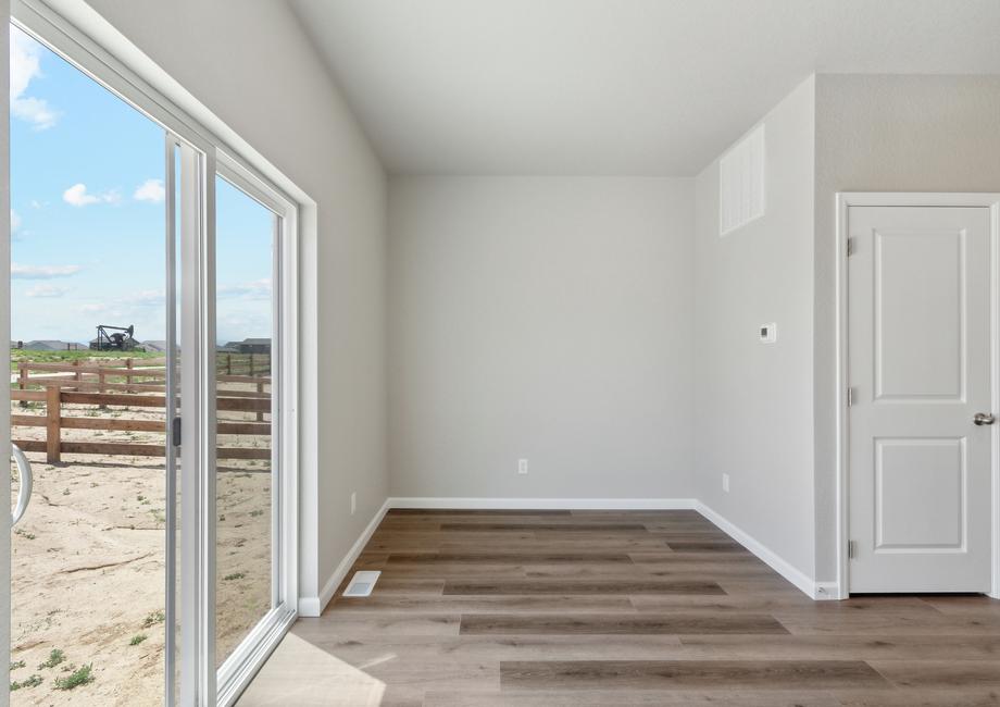 The sliding glass doors of the Platte let in great light and back yard views.