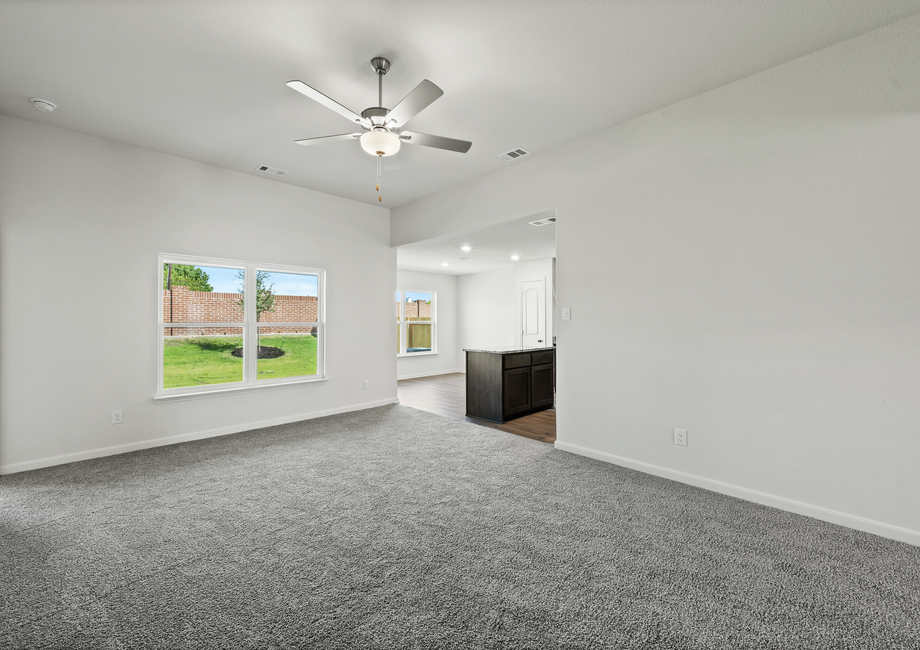 The family room has large windows that let in great, natural light and backyard views.