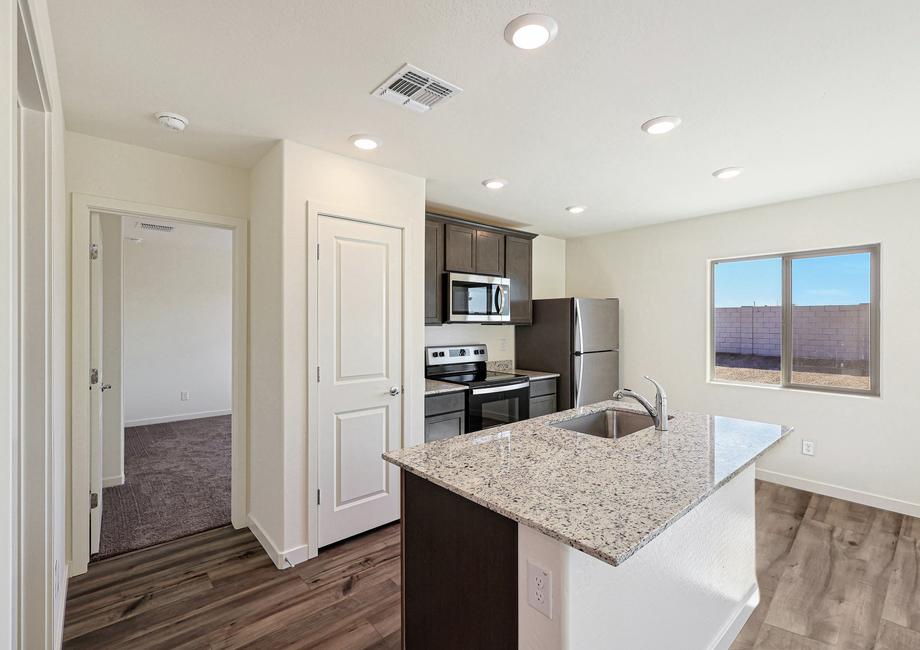 The spacious kitchen is perfect for preparing your family's favorite meals and treats.