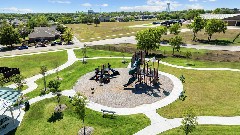 The community park has two children's playsets.